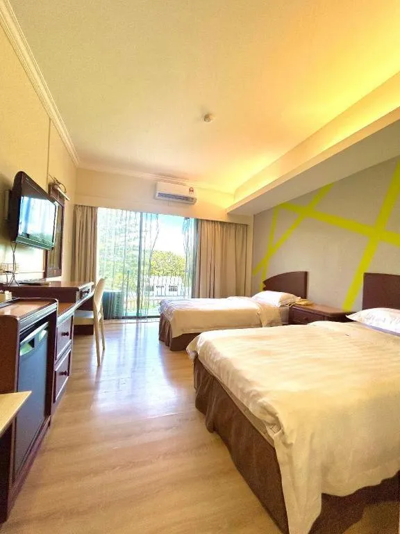 Bed in Casuarina Hotel