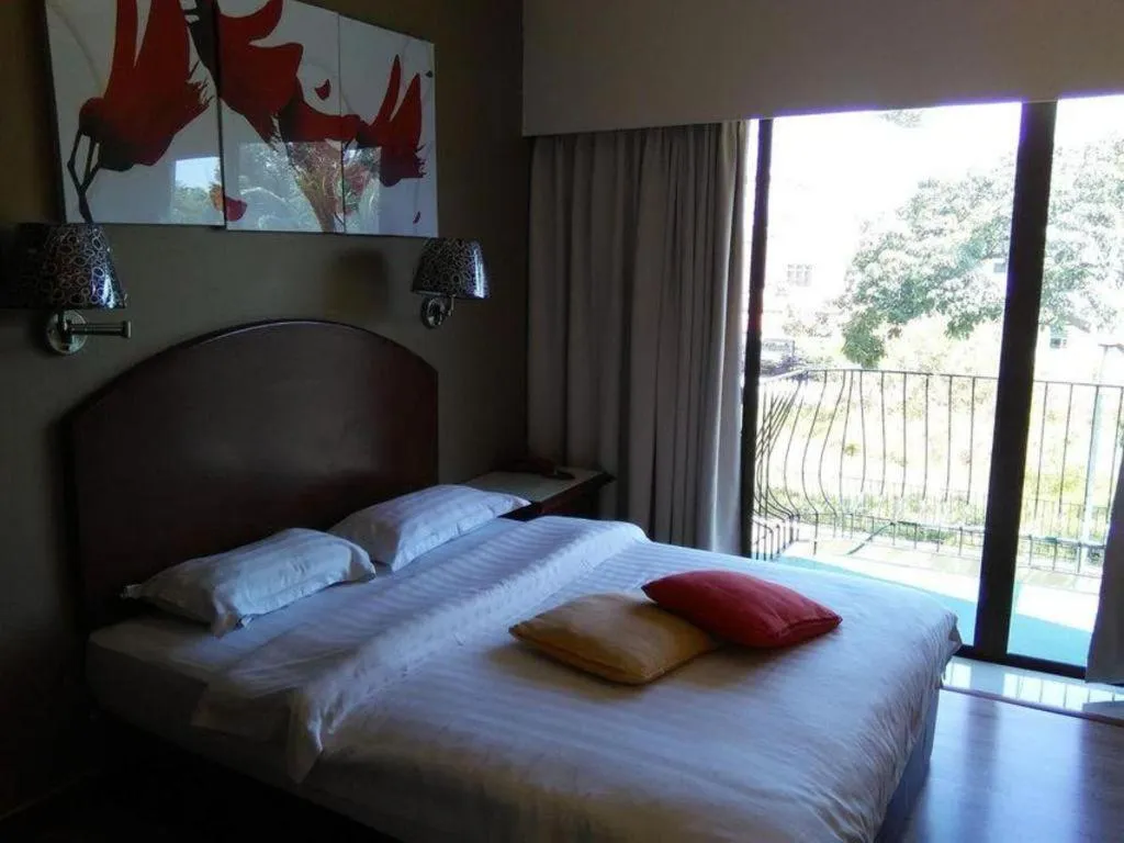 Bed in Casuarina Hotel