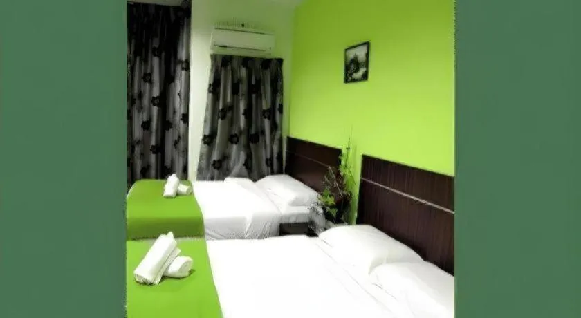 Bed in Eco Hotel Putra Kajang