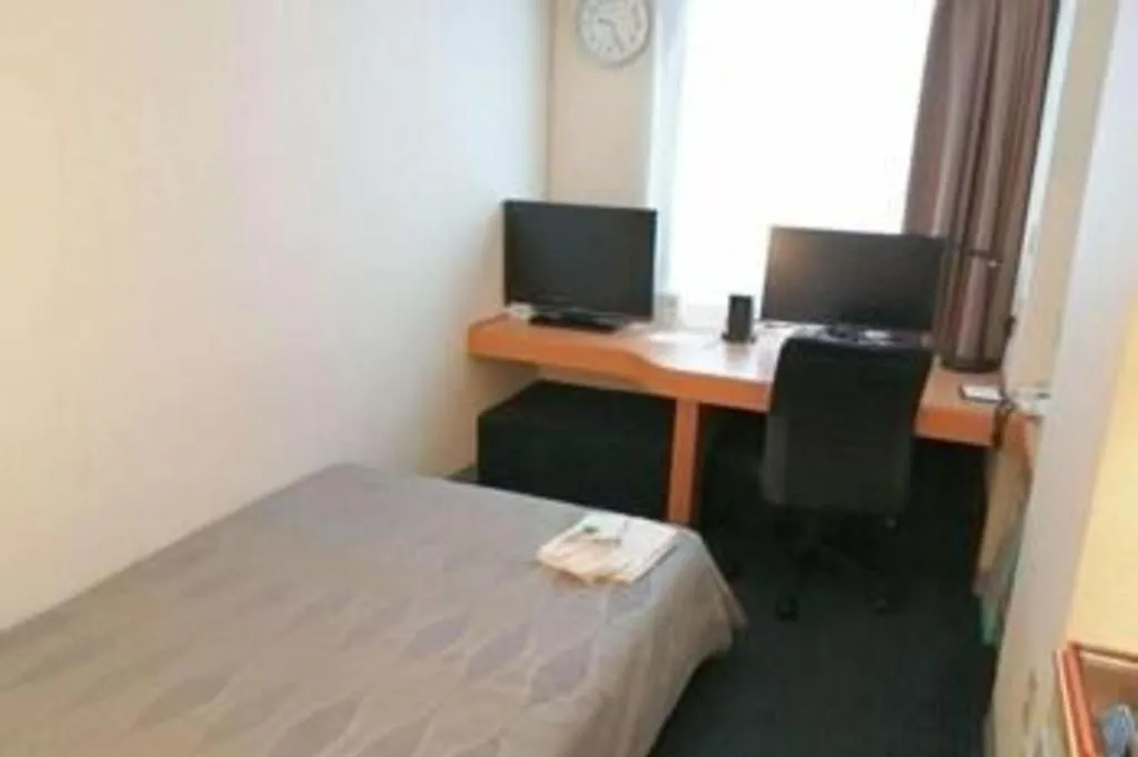 Bed in Roco Inn Matsuyama