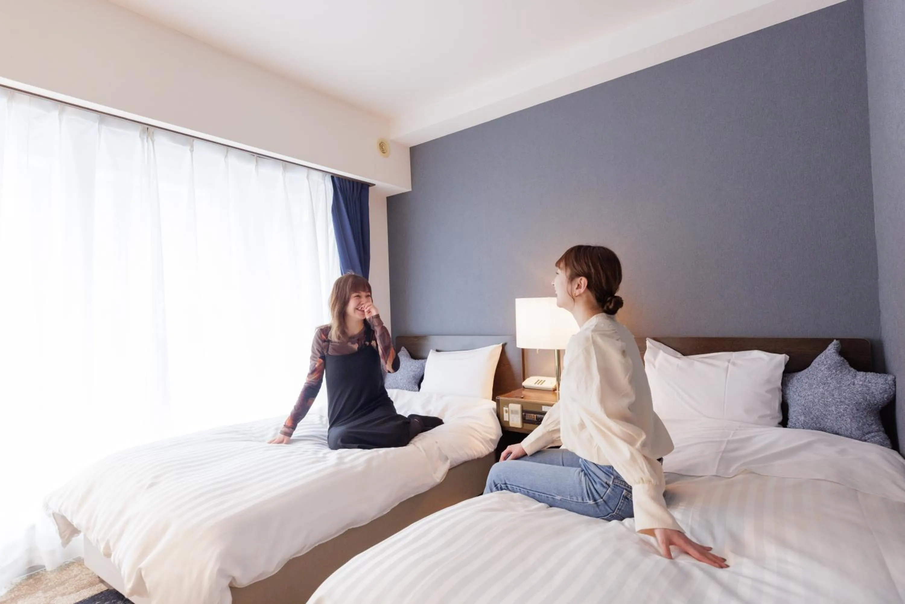 People, Bed in Ashibetsu Onsen Starlight Hotel