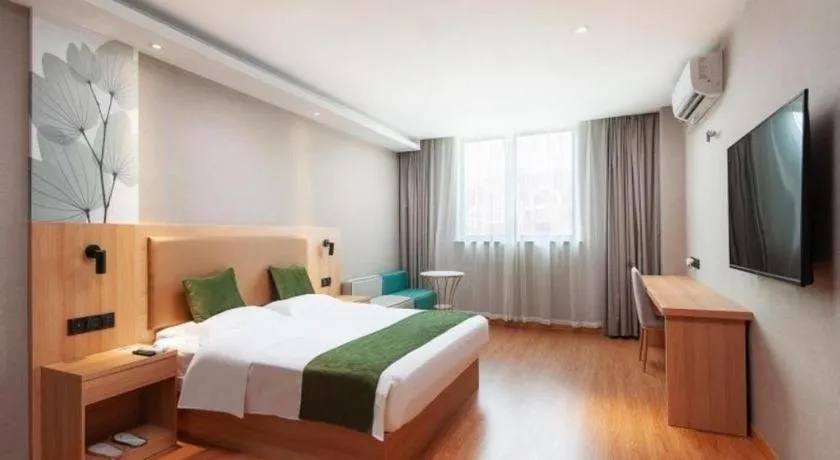 Bed in GreenTree Inn Shanghai Jiading Anting Motor City Express Hotel
