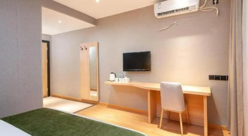 Bed in GreenTree Inn Shanghai Jiading Anting Motor City Express Hotel
