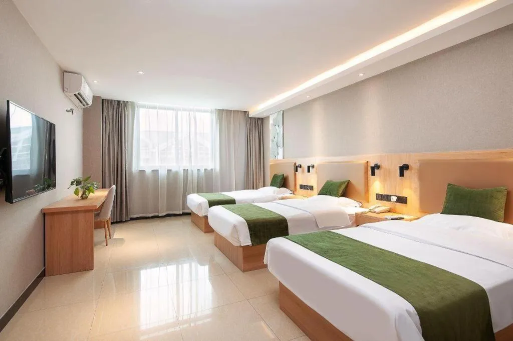 Bed in GreenTree Inn Shanghai Jiading Anting Motor City Express Hotel