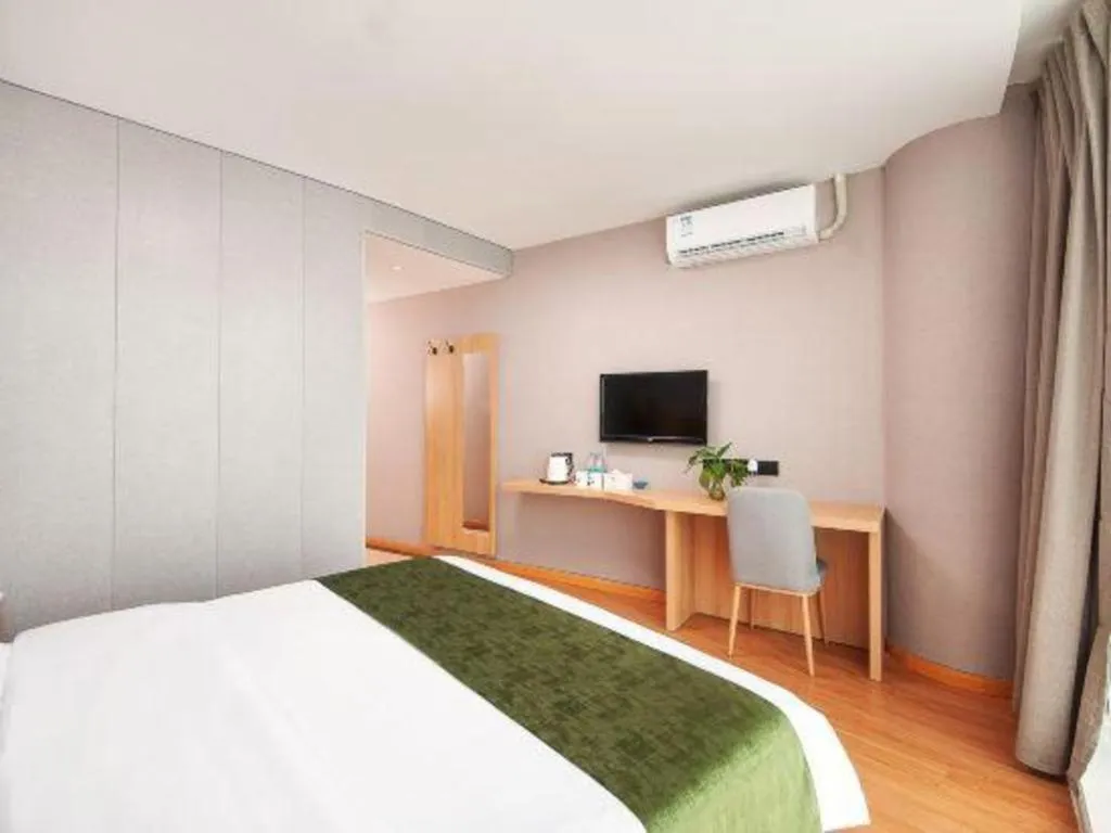 Bed in GreenTree Inn Shanghai Jiading Anting Motor City Express Hotel