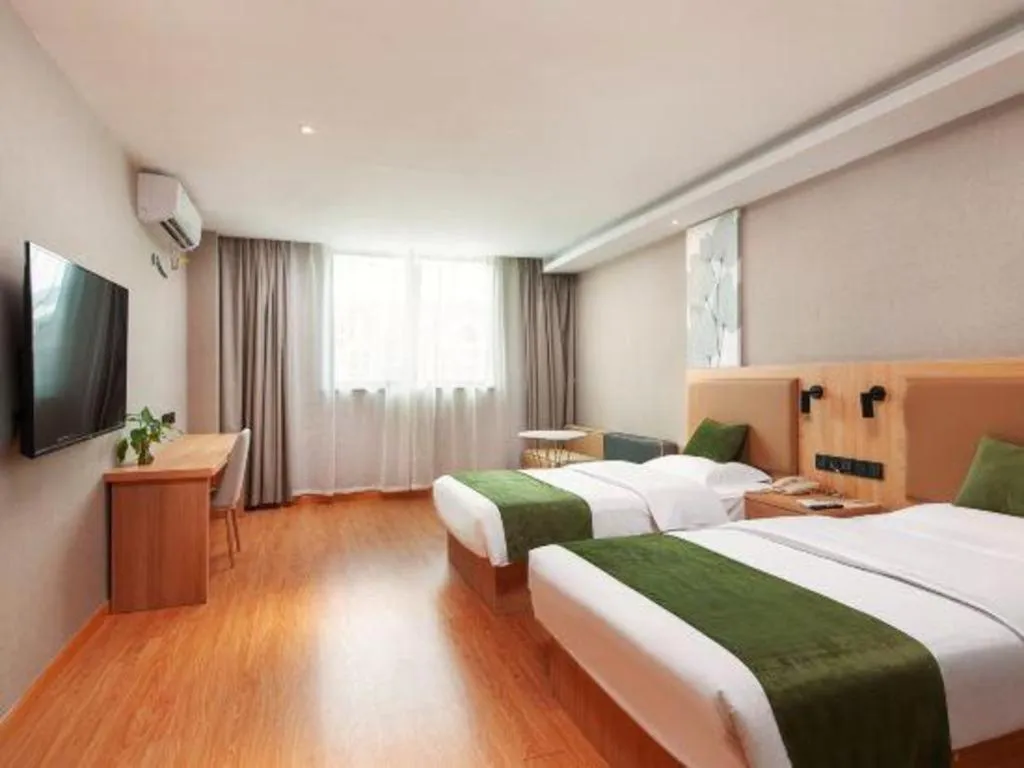 Bed in GreenTree Inn Shanghai Jiading Anting Motor City Express Hotel