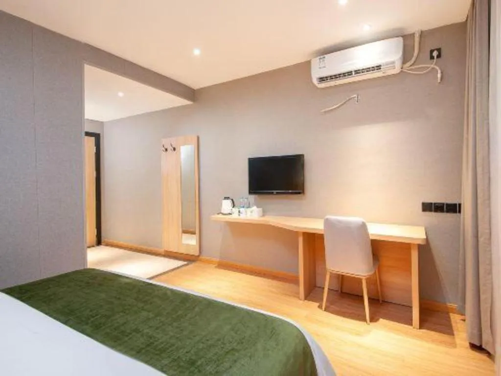 Bed in GreenTree Inn Shanghai Jiading Anting Motor City Express Hotel