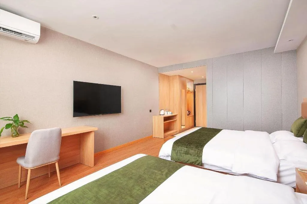 Bed in GreenTree Inn Shanghai Jiading Anting Motor City Express Hotel