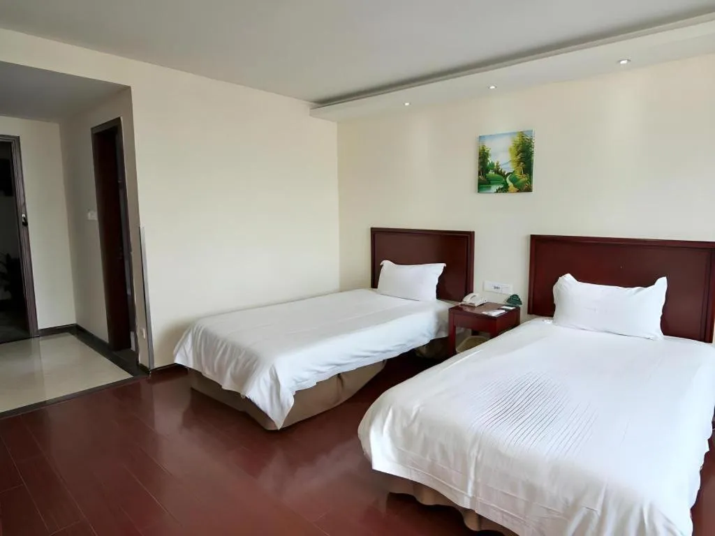 Bed in GreenTree Inn Shanghai Jiading Anting Motor City Express Hotel