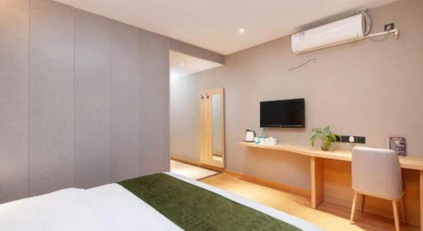Bed in GreenTree Inn Shanghai Jiading Anting Motor City Express Hotel