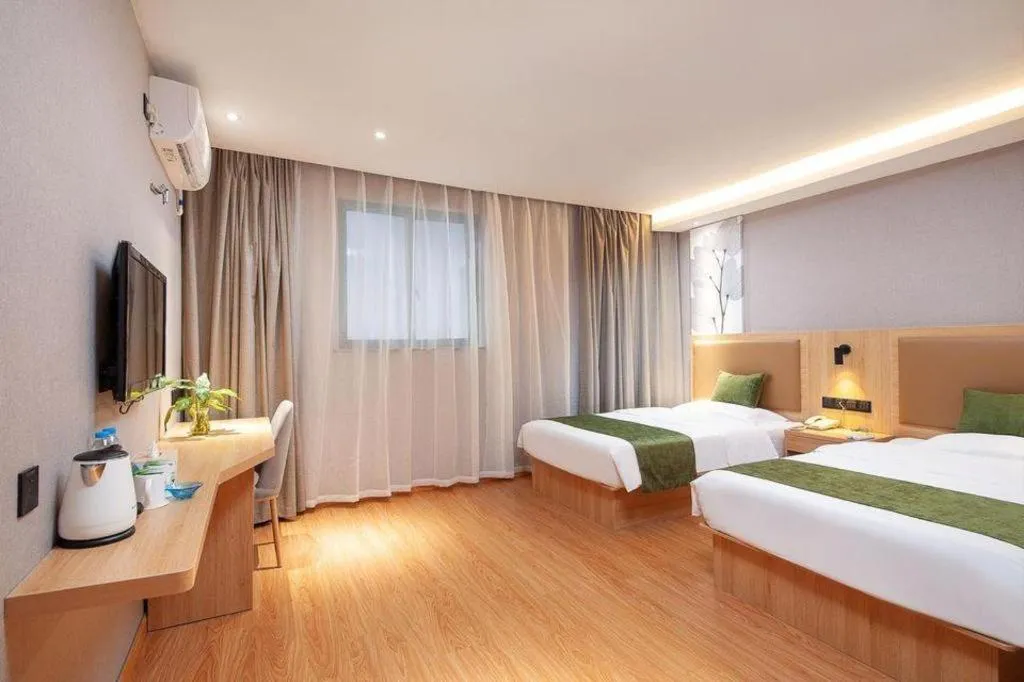 Bed in GreenTree Inn Shanghai Jiading Anting Motor City Express Hotel
