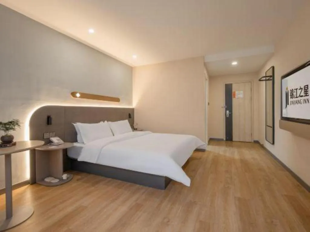 Bed in Jinjiang Inn Hangzhou Lin'an Qianwang Street