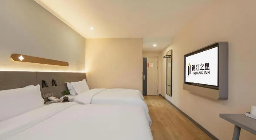 Bed in Jinjiang Inn Hangzhou Lin'an Qianwang Street