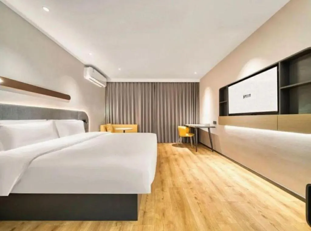 Bed in Jinjiang Inn Hangzhou Lin'an Qianwang Street