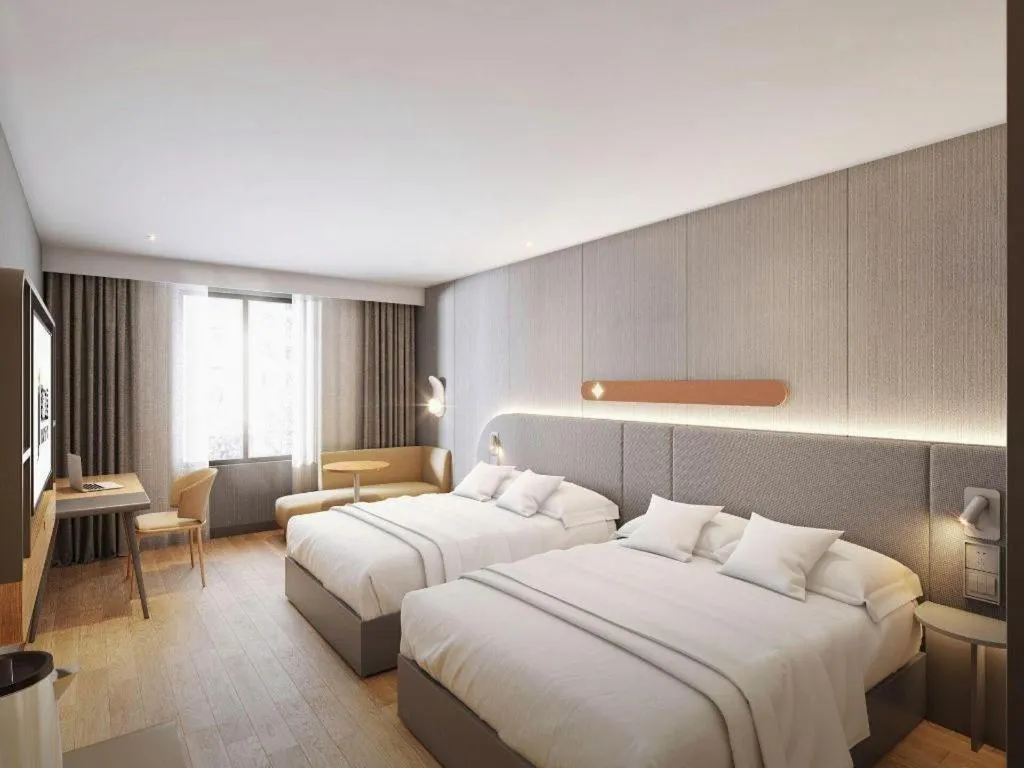 Bed in Jinjiang Inn Hangzhou Lin'an Qianwang Street