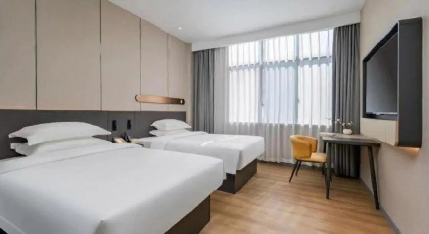 Bed in Jinjiang Inn Hangzhou Lin'an Qianwang Street