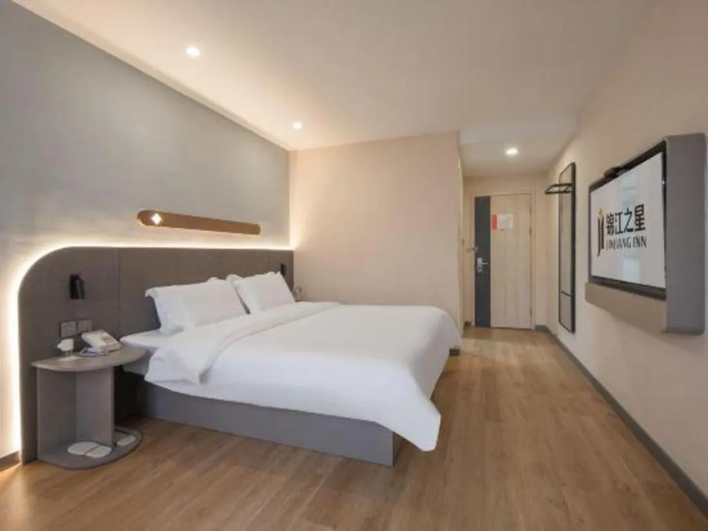 Bed in Jinjiang Inn Hangzhou Lin'an Qianwang Street