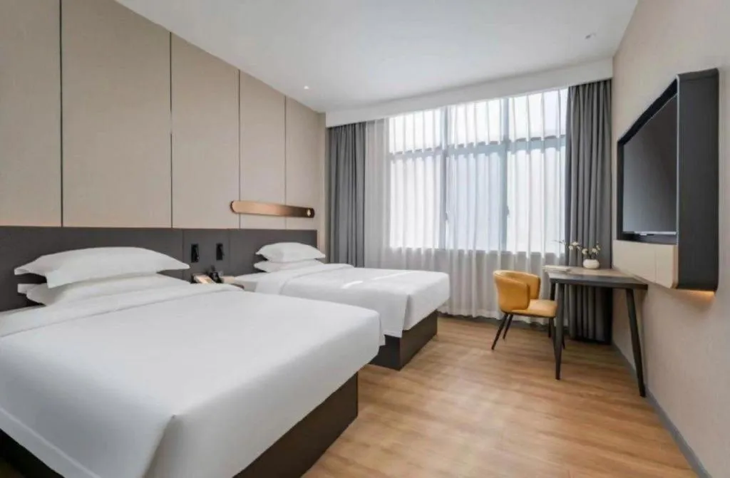 Bed in Jinjiang Inn Hangzhou Lin'an Qianwang Street