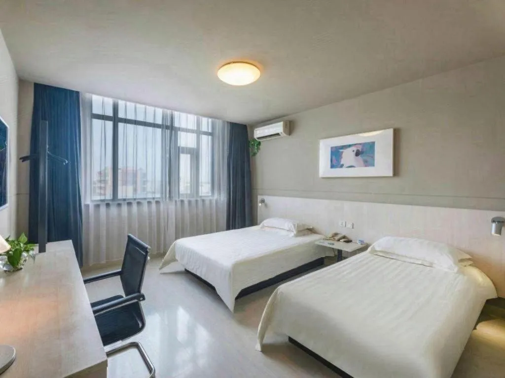 Bed in Jinjiang Inn Hangzhou Lin'an Qianwang Street