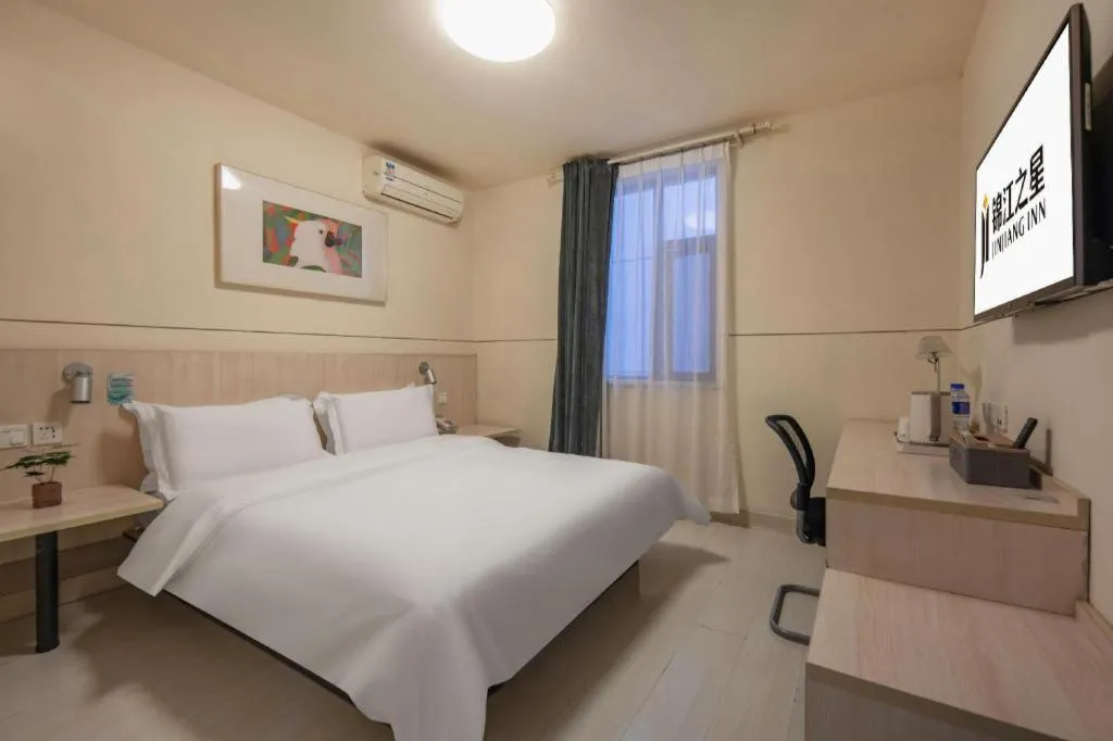 Bed in Jinjiang Inn Hangzhou Lin'an Qianwang Street