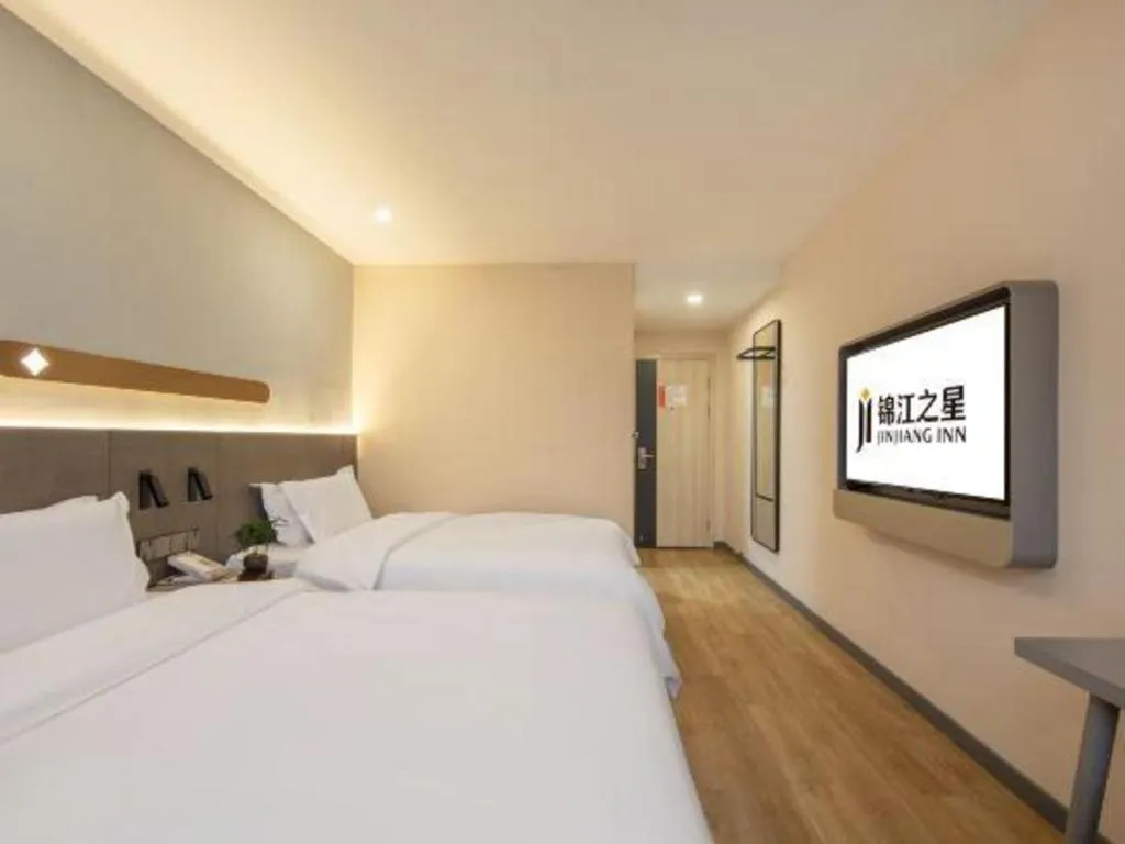 Bed in Jinjiang Inn Hangzhou Lin'an Qianwang Street