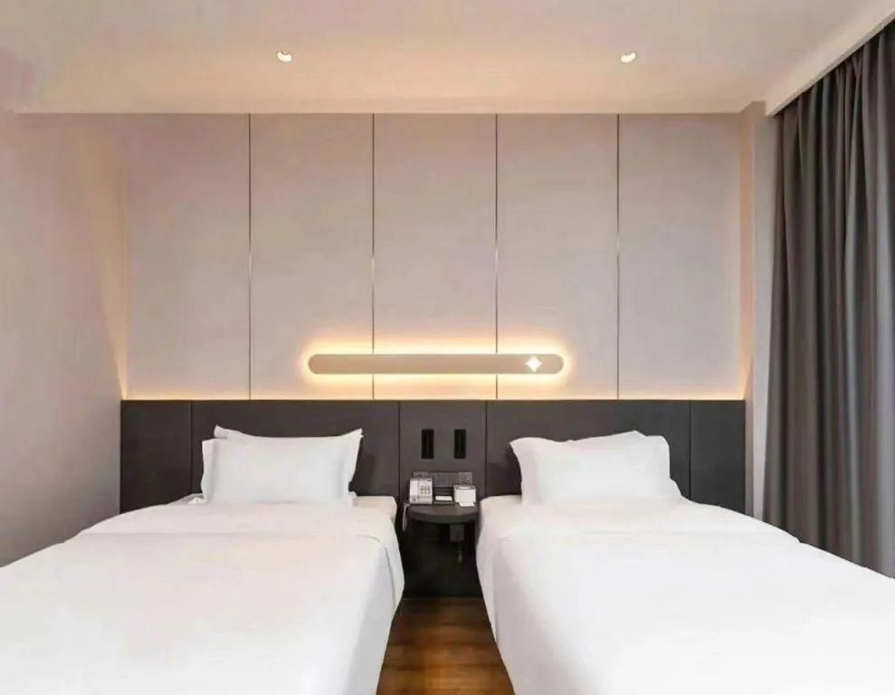 Bed in Jinjiang Inn Hangzhou Lin'an Qianwang Street