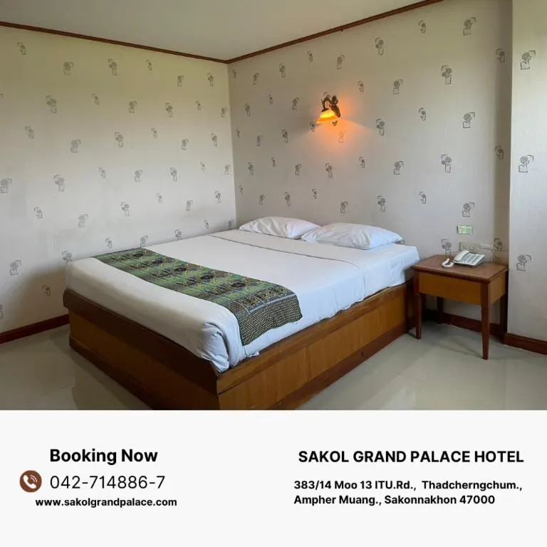 Bed in Sakol Grand Palace Hotel