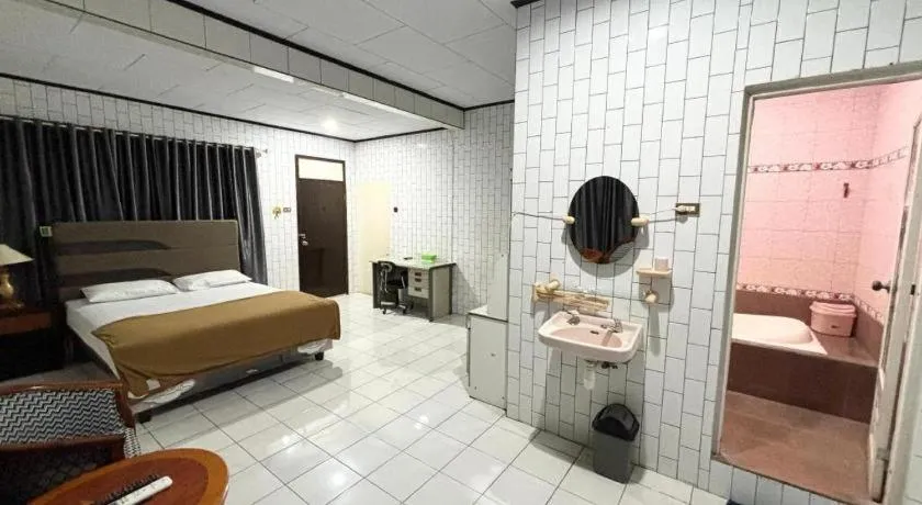 Bed in Sumber Ria Hotel