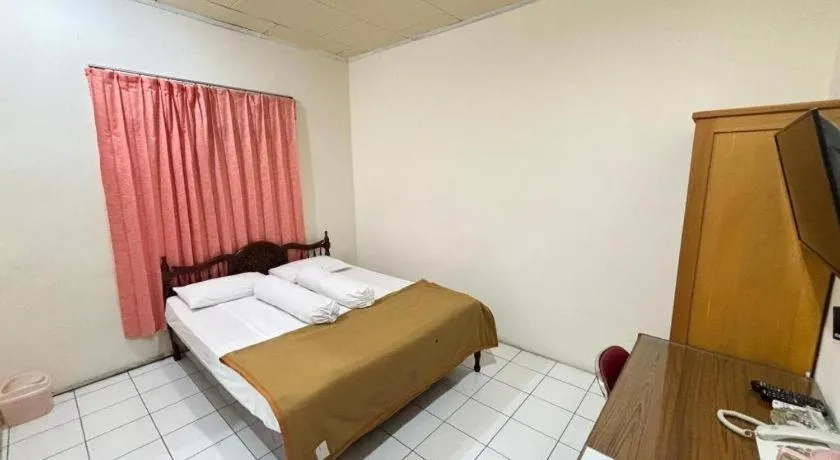 Bed in Sumber Ria Hotel