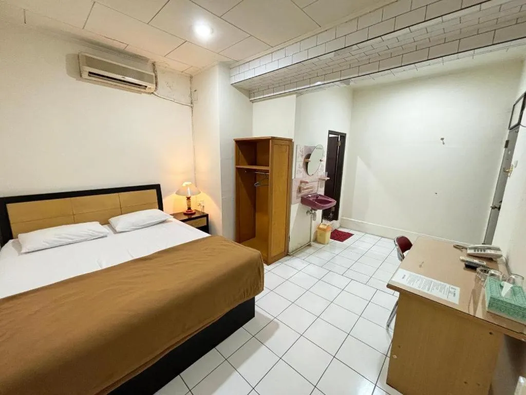 Bed in Sumber Ria Hotel