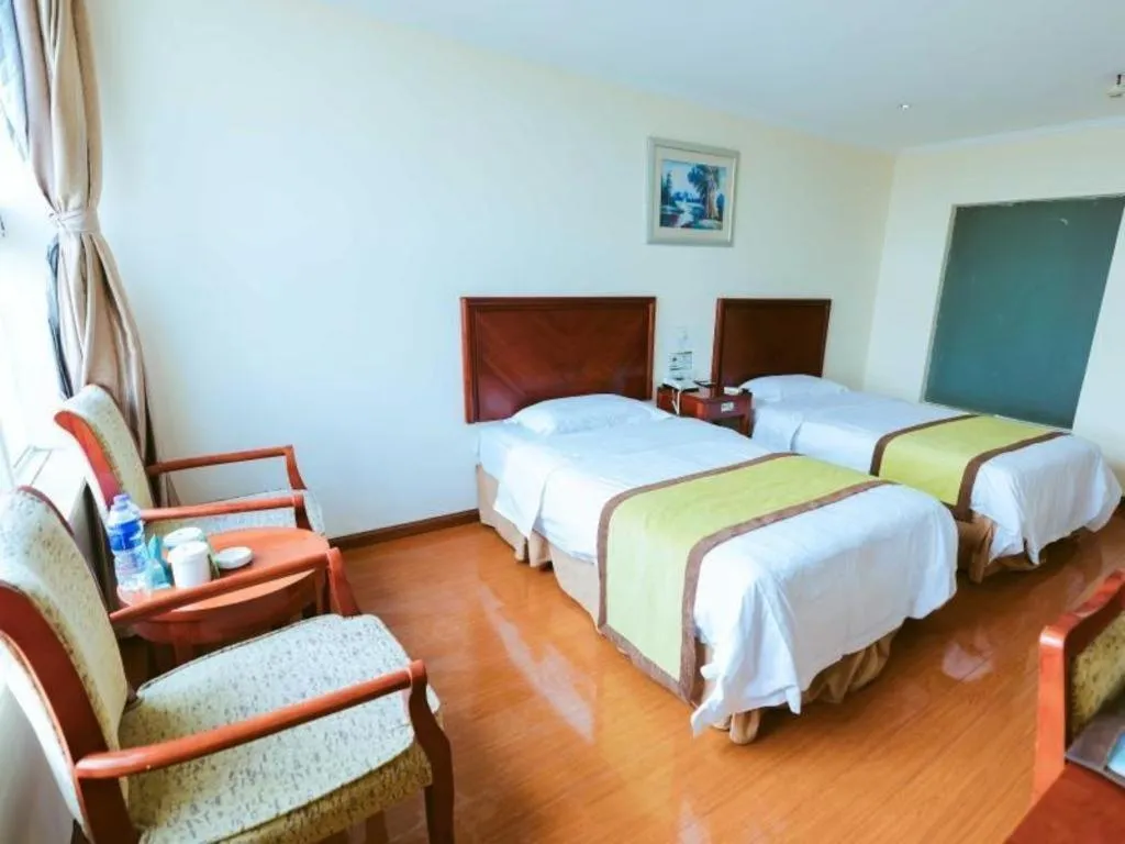 Bed in GreenTree Inn Jiaxing Zhongan Business Hotel