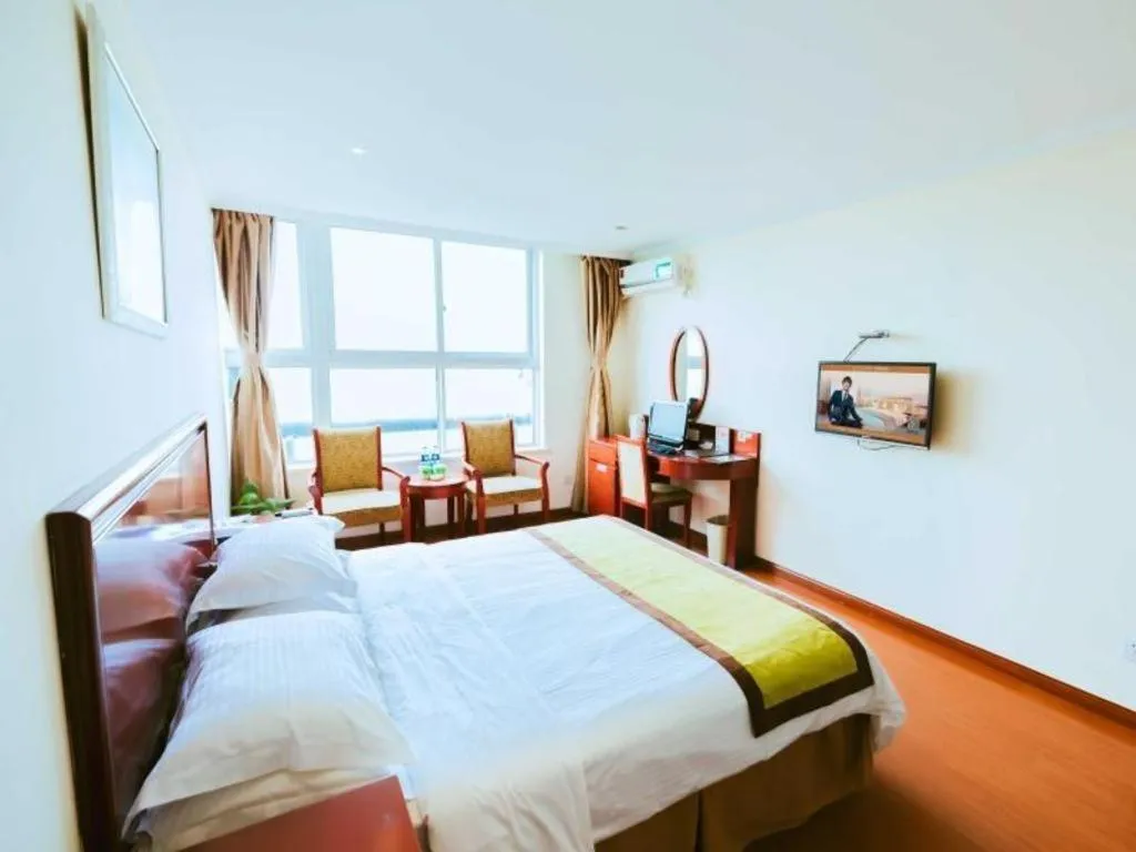 Bed in GreenTree Inn Jiaxing Zhongan Business Hotel