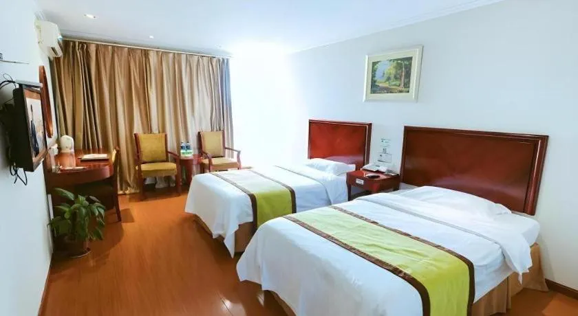 Bed in GreenTree Inn Jiaxing Zhongan Business Hotel