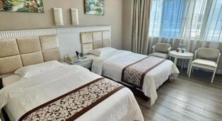 Bed in GreenTree Inn Guangdong Huizhou Chenjiang Intercity Rail Station Business Hotel