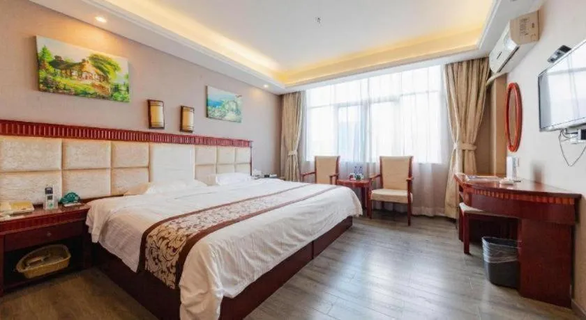 Bed in GreenTree Inn Guangdong Huizhou Chenjiang Intercity Rail Station Business Hotel