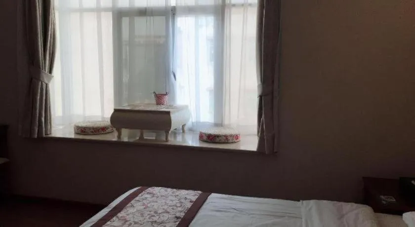 Bed in GreenTree Inn Guangdong Huizhou Chenjiang Intercity Rail Station Business Hotel