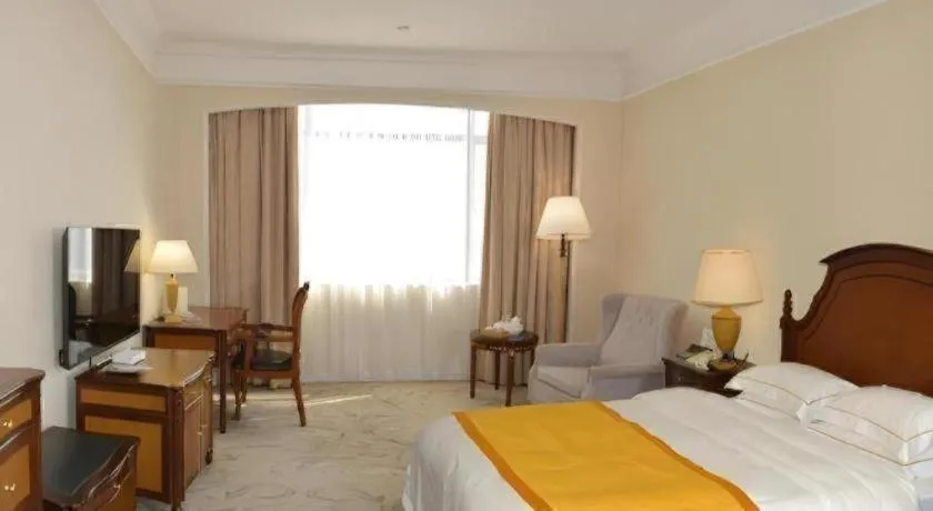 Bed in Shantou Golden Gulf Hotel