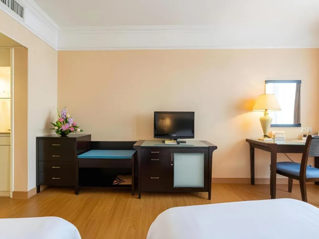 Bed in Shantou Golden Gulf Hotel