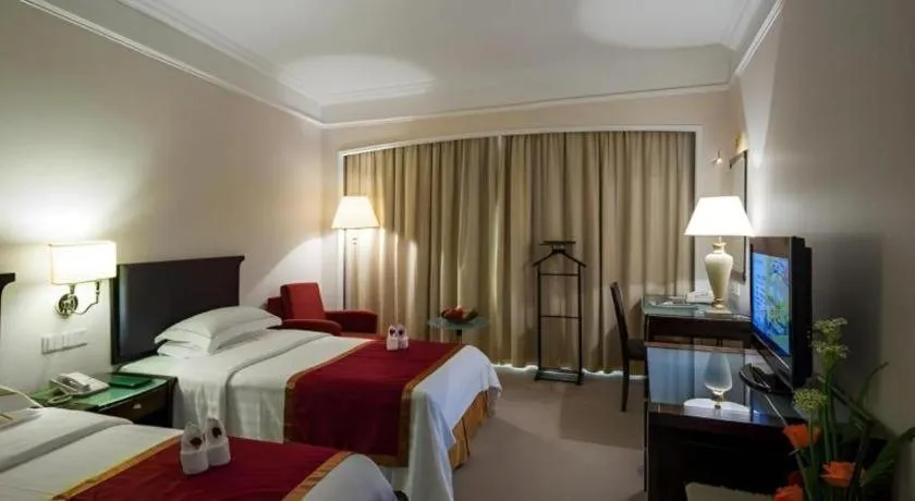 Bed in Shantou Golden Gulf Hotel