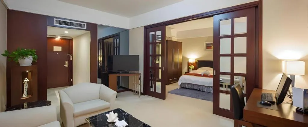 Bed in Shantou Golden Gulf Hotel