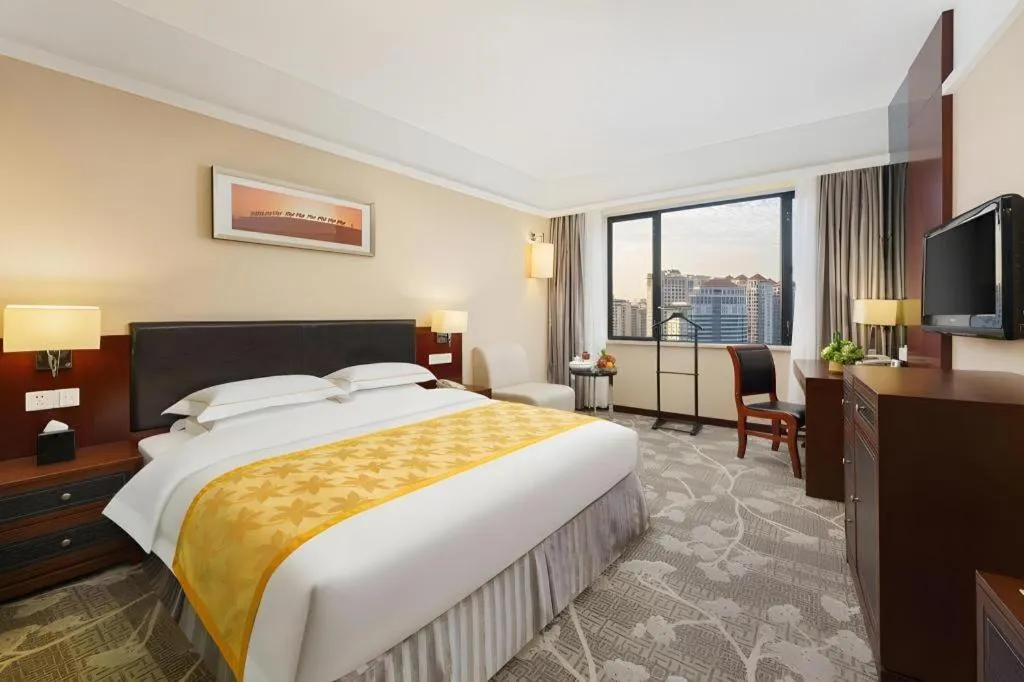 Bed in Shantou Golden Gulf Hotel