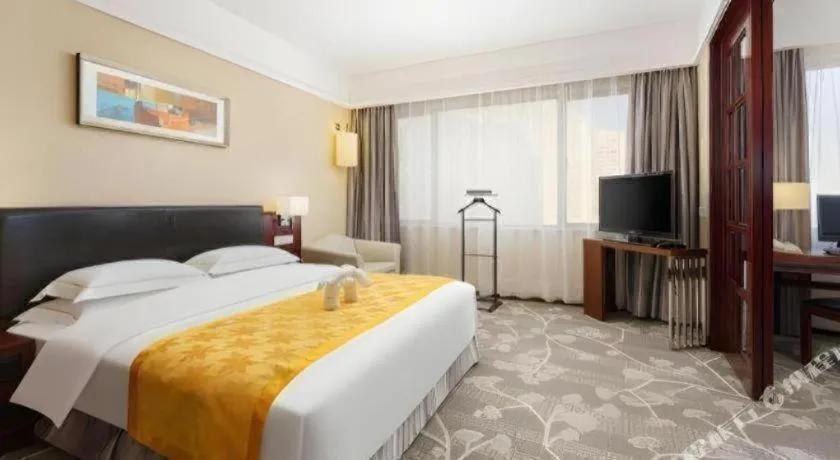 Bed in Shantou Golden Gulf Hotel