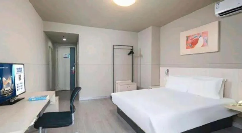 Bed in Jinjiang Inn Zhenjiang Jiangsu University Suning Plaza