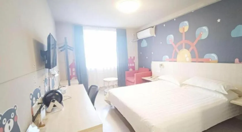 Bed in Jinjiang Inn Zhenjiang Jiangsu University Suning Plaza