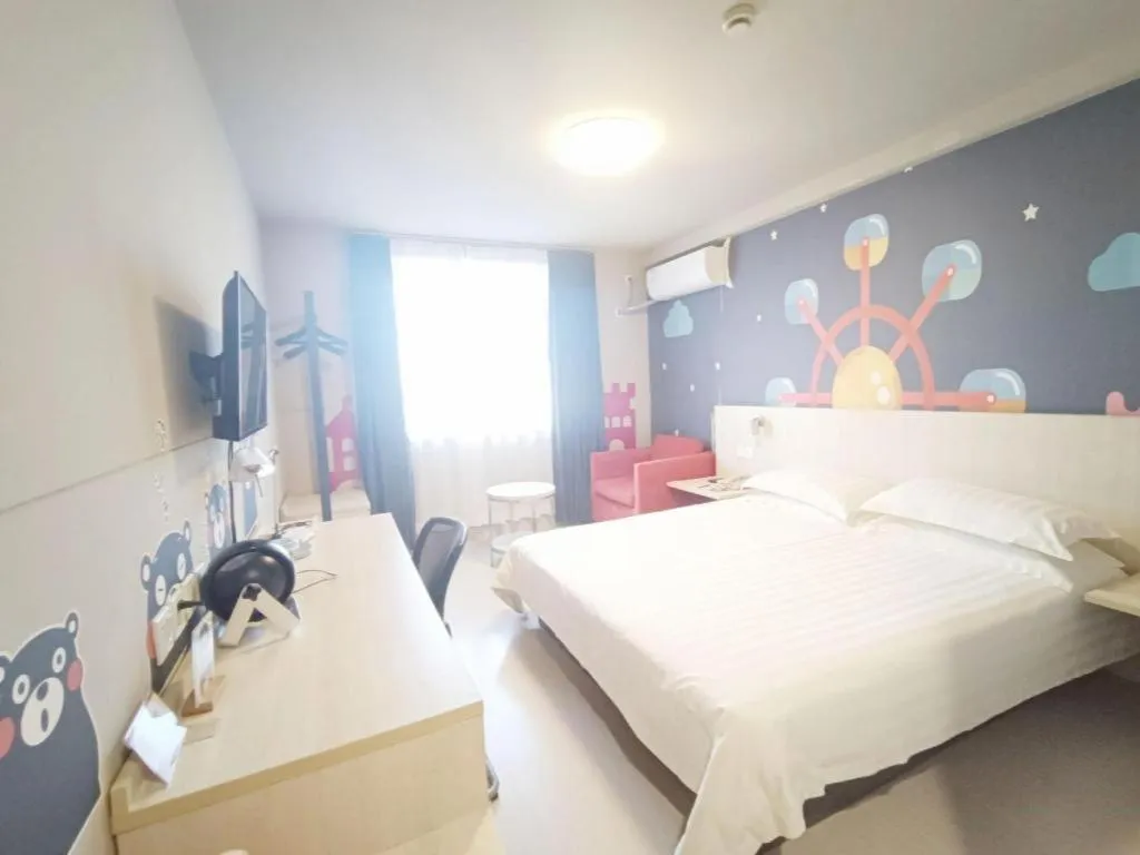Bed in Jinjiang Inn Zhenjiang Jiangsu University Suning Plaza