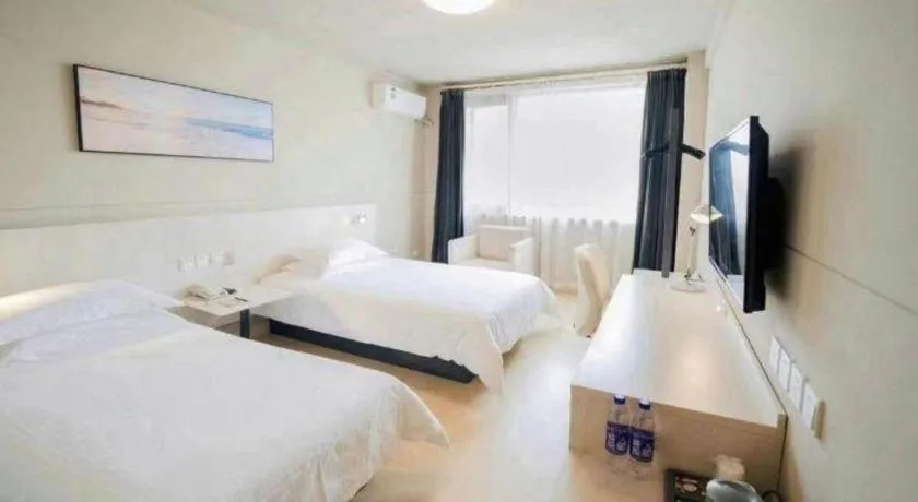 Bed in Jinjiang Inn Zhenjiang Jiangsu University Suning Plaza