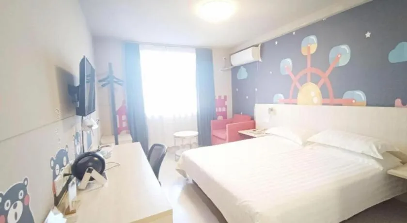 Bed in Jinjiang Inn Zhenjiang Jiangsu University Suning Plaza
