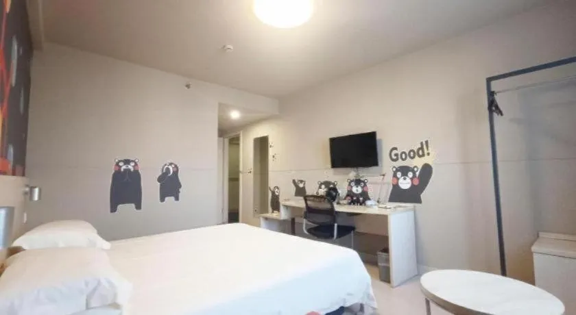 Bed in Jinjiang Inn Zhenjiang Jiangsu University Suning Plaza