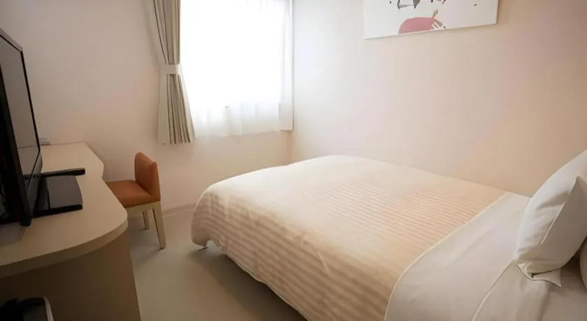 Bed in Spa Land Hotel Naito