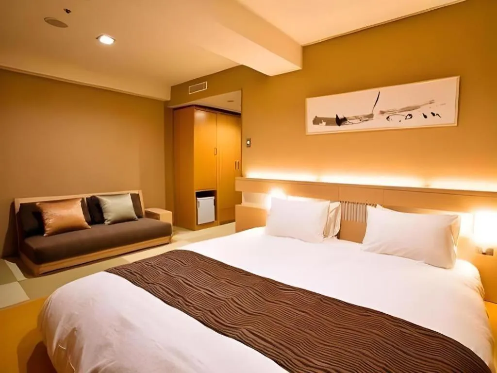 Bed in Spa Land Hotel Naito